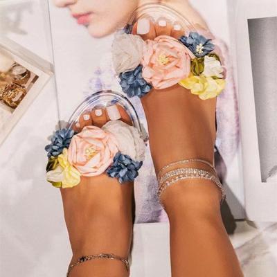 China Fashion Trend Designer Flat Ladies Slippers Clear Rubber Slippers Summer Wholesale Women's Sandals Slippers With Flower for sale