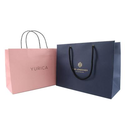 China Handmade Customized Brand Printed Logo Luxury Boutique Shopping Paper Gift Bags Wholesale Custom Logo Black Paper Bag With Black Rope Han for sale