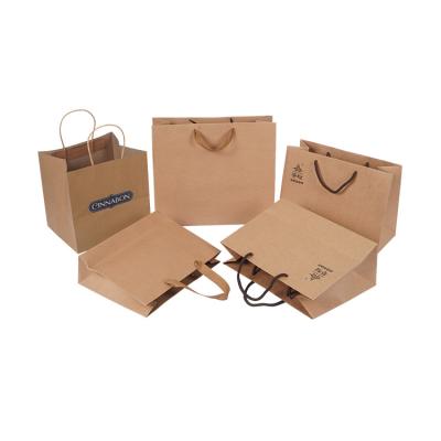 China Recyclable Guaranteed Quality Shoe Paper Bag Packaging Custom Handle Brown Yellow Kraft Paper To Make Paper Bags And Logo Tag With Logo for sale