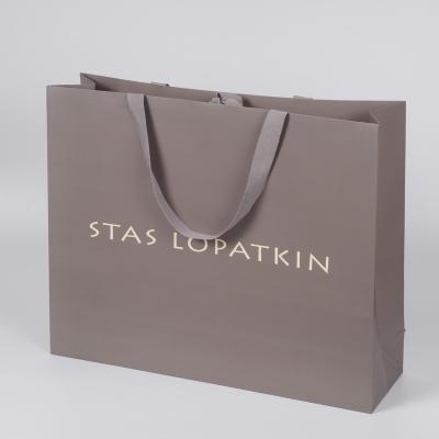 China Handmade Wholesale Custom Small Kraft Paper Gift Jewelry Paper Bag With Your Own Logo for sale