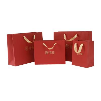 China Professional Handmade Manufacturer Product Jewelry Red Paper Bag Packaging With Ribbon Handles For Jewelry for sale