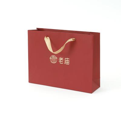 China Beautifully Designed High Quality Handmade Paper Bags Customized Shopping Paper Jewelry Gift Bag Customized for sale