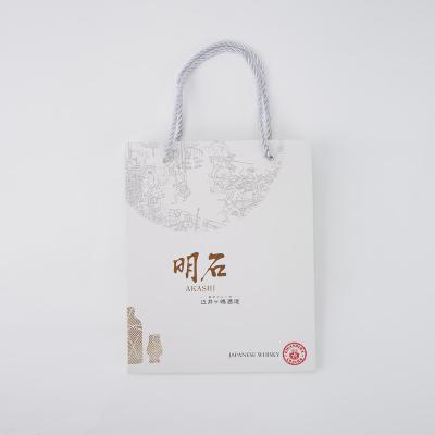 China Wholesale Custom Shopping Recyclable Logo Paper Bag Garment Storage China Supplier Carry Bag For Gifts for sale