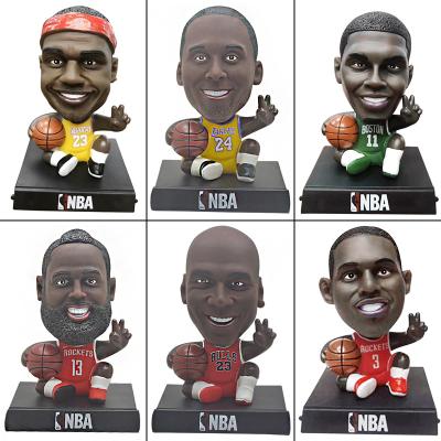 China New 2022 basketball and football star stock number PVC hand doll car ornaments head spots stock number shaking stock number wholesale for sale