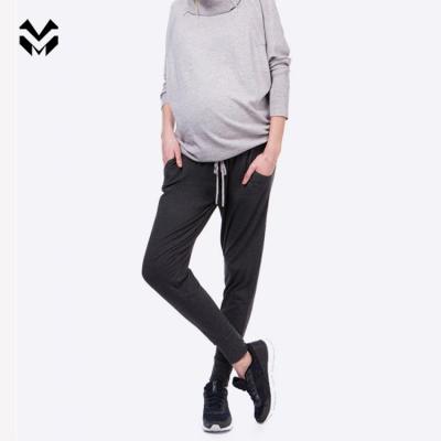 China Women Antibacterial Soft Flexible Clothing Fitness Cotton Pregnant Women Loose Pants Clothes Maternity Joggers for sale