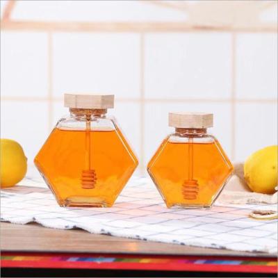 China Wholesale 220ml Honey Storage Tank Eco-Friendly Clear Jar Hexagon Box Eco-Friendly Glass Honey Jar And Dip for sale