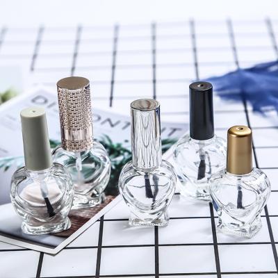 China Wholesale luxury empty design 10ml 15ml personal care ncolor coated gel nail polish bottle with brush cap for sale