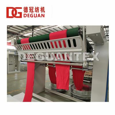 China Garment Shops Tubular Fabric Expander For Knit Fabric | Spread Machine | DEGUAN machinery for sale