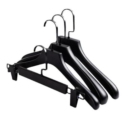 China Contemporary Wooden Mute Black Non-slip Coat Hanger Clothing Support Shelf Floating Rack for sale