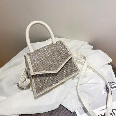 China 2021 New Version Fashion Diamond Fashion Handbag Crystal Shiny Purses Korean Small Portable Square Bag Women Purses for sale