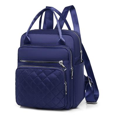 China Cheap Waterproof Navy Blue Embroidered Side Pockets Feminine Comfortable Woman Tote Backpack Outdoor Sling Bag Polyester Lining Handbag for sale