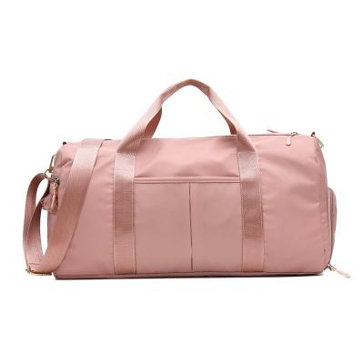 China Outdoor Custom Portable Desiger Gym Sports Fashion Traval Pink Waterproof Duffel Bags For Women for sale