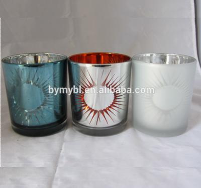 China Home Decoration Sun Patterned Candle Holder Hurricane Candle Holder Glass Votive Factort for sale