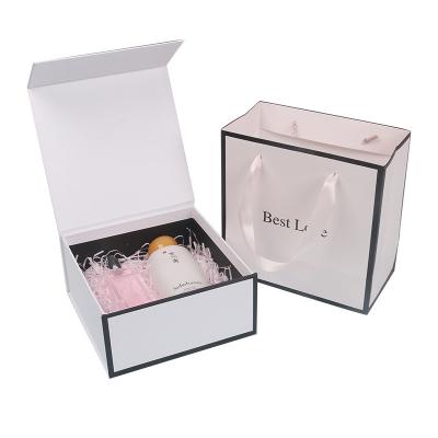 China Recyclable Custom White Minimalist Style Square Magnetic Gift Boxes With Ribbon for sale