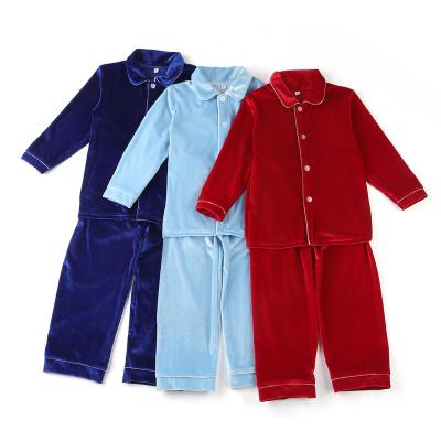 China Christmas Velvet Thermal Fabric Long Sleeves Single Color Button Up Winter Kids Boys Casual Pajamas for sale