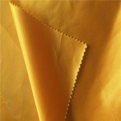 China Flame Retardant 100 Polyester Shine Knitting Silk Feeling Knitting Fabric For Women Cloth for sale