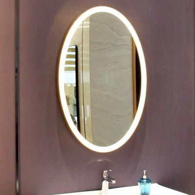 China Home Decor Minimalist Modern Luxury Metal Framed Mirrors Living Room Oval Wall Gold Mirror for sale