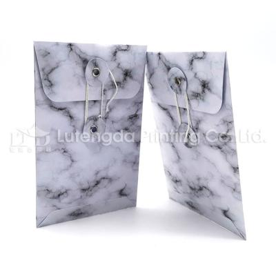 China High Quality Eco-friendly Kraft Paper Envelope With Button And String Tie for sale