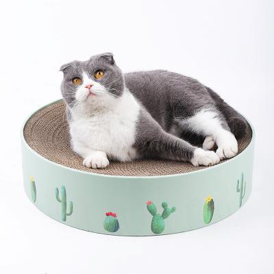 China Sustainable Green Round Shape Cardboard Interactive Cat Scratcher Toy Corrugated Scratch Board for sale