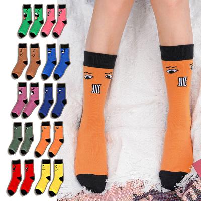 China Breathable unisex European personality expressions and fun American cotton color casual cartoon sports tube socks for sale