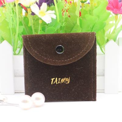 China Custom Jewelry Gold Foil Logo Suede Jewelry Pouches With Button Envelope Snap Jewelry Pouch for sale