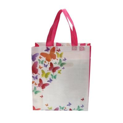 China Rongmei New Product Pretty Handled Butterflies Design Printing Nonwoven Gift Bag for sale