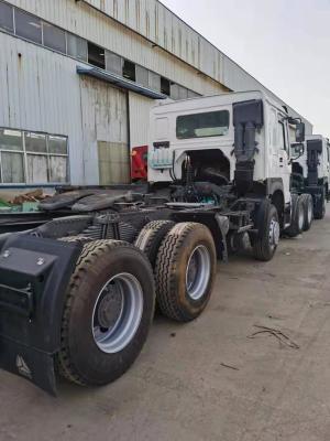 China EURO blanco III HW19710 del color 2014 375HP WD615.96E de los camiones del tractor de Sinotruck Howo de la nueva/segunda mano en venta