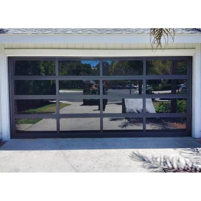 China Custom Crafted Heat Insulation Garage Doors with England Series Design and Reflective Glass Stylish and Durable Steel Garage Doors for sale