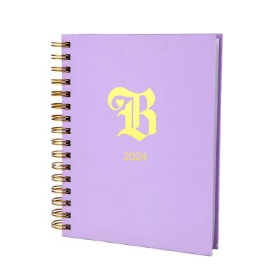 Cina 2023 A4 A5 Spiral Notebook Planner con stampa su foglio d'oro e layout giornaliero datato in vendita