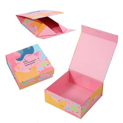 China Low MOQ Luxury Pink Foldable Magnetic Closure Gift Boxes With Ribbon for Photo Frame for sale