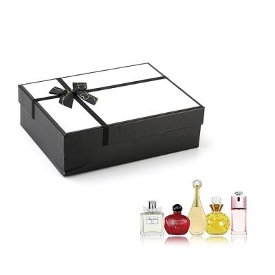 China Custom Size Accepted Black Lid And Base Perfume Gift Packaging Paper Box With Ribbon for sale