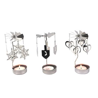 China New Design Home Decor Metal Ornaments Candle Holder Fashionable Rotating Candle Holder for sale