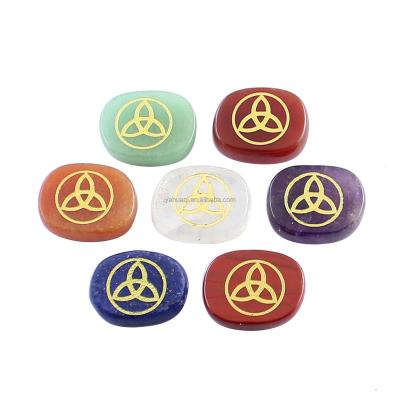 China European and American wholesale chakra crystal stone set 7 color carved pattern healing stone decoration for sale