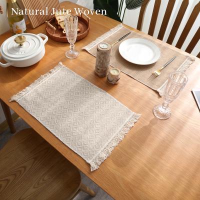 China Sustainable Woven Jute Dining Tea Mat Hotel Table Placement Mat Set Luxury Bohemian Nordic Kitchen Decor With Tassel for sale