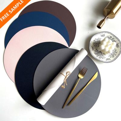 China Sustainable Hot Selling Luxury Round Leather PU Leather Round Two Tone Dinner Place Mat Table Mat Set for sale