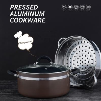 China Durable Pressed Aluminum Non-Stick Multifunctional Cooking Pot With S/S Steamer Basket for sale