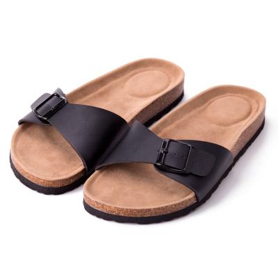 China Indoor Women's Adjustable Buckle 1-Strap Cork Sandal Slide Flat Shoes Popular Black Leather Slippers for sale