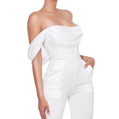 China Breathable Off The Shoulder Women Corset Jumpsuit Flared Crepe Bandage Flared Legs Jumpsuit for sale