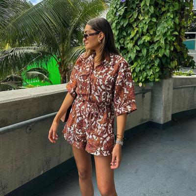 China Floral Summer QUICK DRY Romper Elegant Women Short Sleeve One Piece Jumpsuit for sale