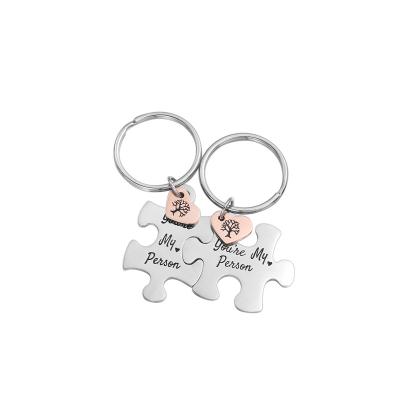 China Eco-Friendly Wholesale High Quality Couple Charm Puzzle Stainless Steel Key Chains I Love You Pendant for sale