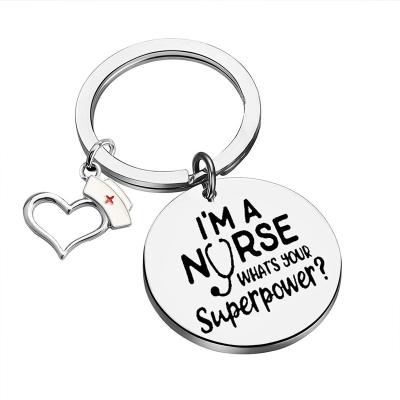 China Welcome Customize Nurses Day Gifts 30mm Dia Round Laser Logo I Am A Nurse Keychain Stainless Steel for sale