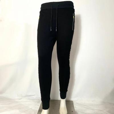 China Anti-wrinkle new design love and roses pants custom logo increasing panty black wear pants for sale