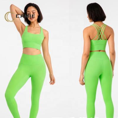 China CAMIE Antibacterial 20 Colors Sports Suit Cutest Workout Tops Soft Design Women Gym Wear Nylon Yoga Butter Set for sale