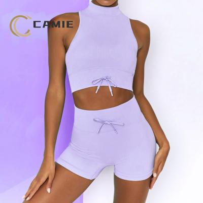 China Breathable Candy Color Women SPORT CAMIE Ribbed Gym Wear New Fashion Two Piece Short Sport Tops Seamless Yoga Shorts Set Women for sale