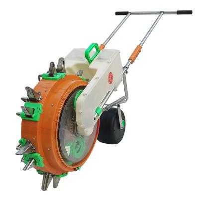 China Farms Multifunctional sowing and fertilizing machine Hand push planter Hand seeders corn peanut precise seeder for sale