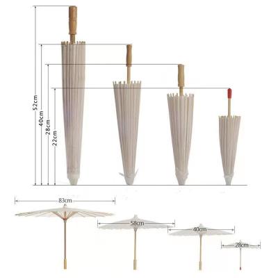 Chine Requis faits à la main Parapluie en papier japonais blanc avec dessins personnalisés Impression de logo à vendre