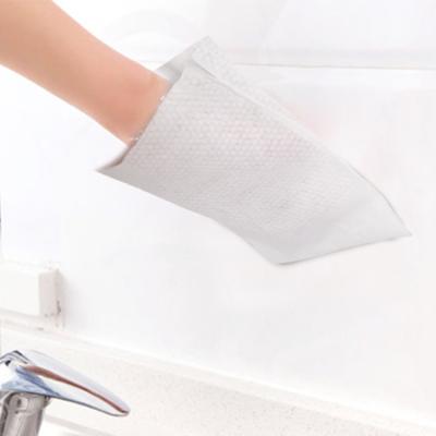 China Household cleaning Soft 23*15cm Disposable 100gsm Non-Woven household cleaning glove patient washing mitts for sale