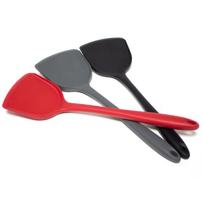 China Kitchen Cookware Food Grade Red Long Handle Silicone Stocked Heat Resistant Spatula For Non Stick Pot for sale