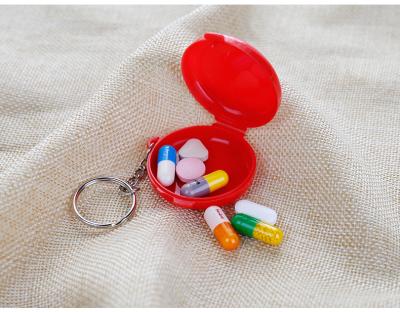 China Small And Convenient Plastic Pill Box Compact And Convenient Round Pill Case for sale