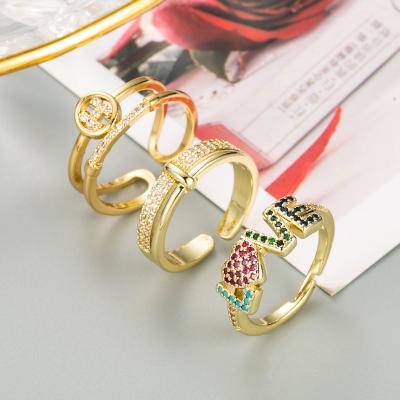 China Fashion Trend Love Ring Geometric Open Ring Zircon Fashion Couples Love Knot Copper Inlaid Creative Ring for sale